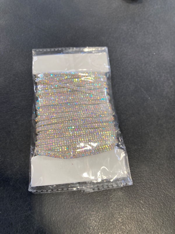 Photo 1 of LYXMYGS 10-Yard Rhinestone Ribbon Self Adhesive Crystal Rhinestones, 2-Rows Bedazzling Strips, 10-Yard Rhinestone Strips for DIY Craft, Rhinestones for Crafting, Home Decor, AB Crystal