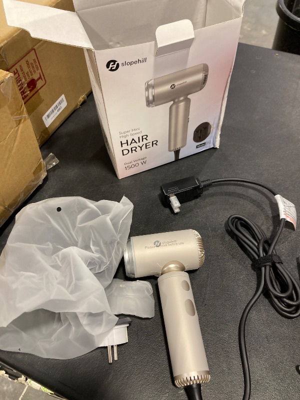 Photo 1 of slopehill Dual Voltage Travel Mini Hair Dryer, Lightweight Ionic Blow Dryer, Professional Fast Drying, Compact Portabe Quiet Hairdryer with Magnetic Diffuser for Women, International European 100-240V