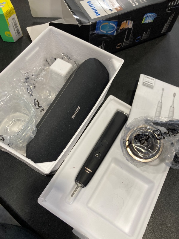 Photo 1 of Philips Sonicare DiamondClean Smart 9300 Electric Toothbrush - Sonic Toothbrush with App, Pressure Sensor, 12 Brushing Settings, Replacement Reminder, Travel Case, Black, Model HX9903/15