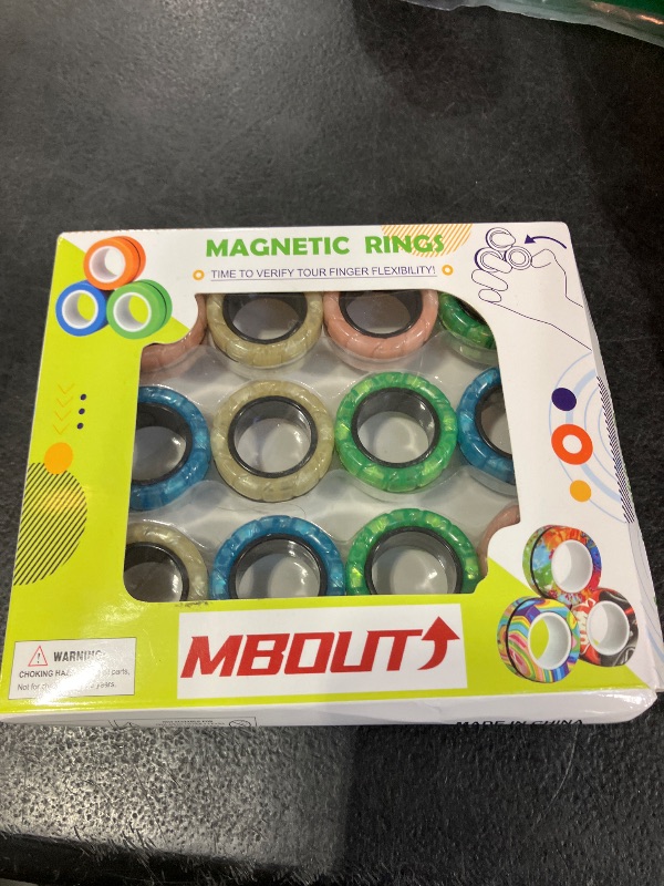 Photo 1 of MBOUTrising Magnetic Rings Finger Fidget Toys Set, 12Pcs Glow in The Dark Magnets Rings for Training Relieves Autism Anxiety, Magical Fingears Rings for ADHD, Great Idea Gift for Adults Teens Kids