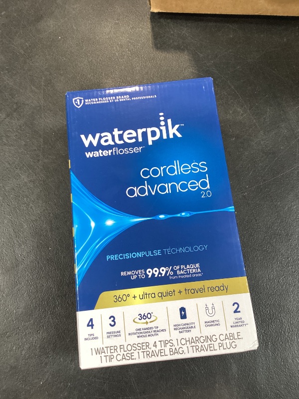 Photo 1 of Waterpik Cordless Advanced 2.0 Water Flosser For Teeth, Gums, Braces, Dental Care With Travel Bag and 4 Tips, ADA Accepted, Rechargeable, Portable, and Waterproof, White WP-580, Packaging May Vary