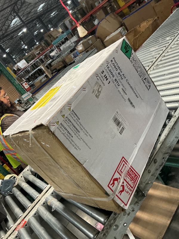 Photo 1 of **FACTORY SEALED**Tanoxo 12000 BTU Portable Air Conditioner