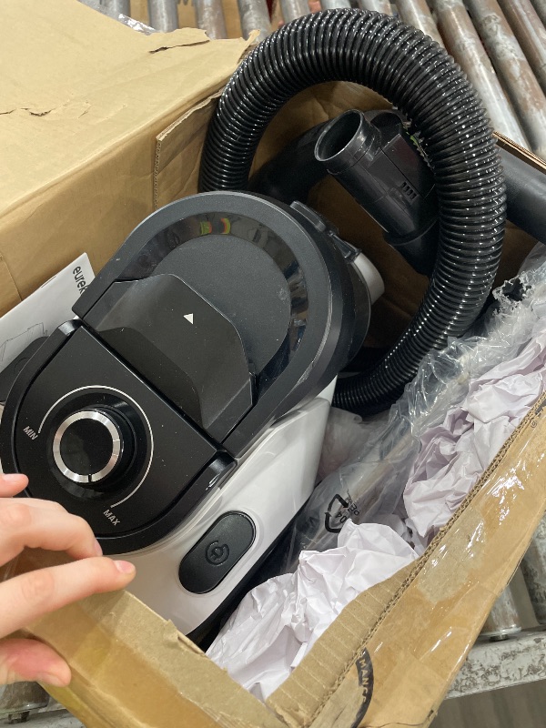 Photo 1 of **MISSING PIECES**Eureka Bagless Canister Vacuum Cleaner, White