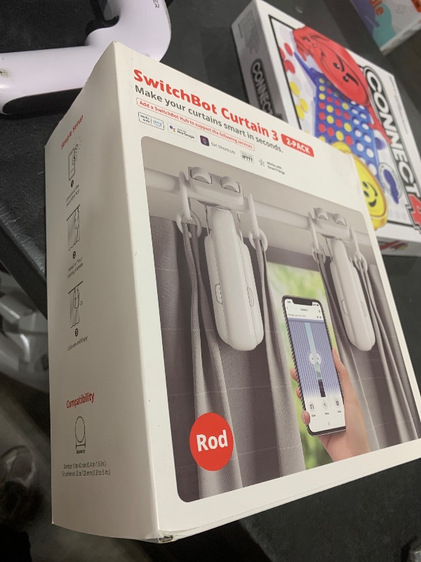 Photo 1 of SwitchBot Curtain Opener 2-Pack with Remote