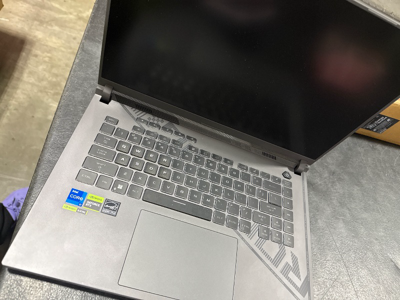 Photo 1 of NON-FUNCTIONAL. PARTS ONLY--------------------------------ASUS ROG Strix G16 Gaming Laptop FHD 165Hz RTX 4060 i7-13650HX 16GB DDR5 512GB
