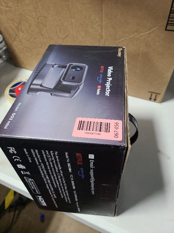 Photo 1 of [High ANSI/ 330°Stand/NetfIix Included] 4K-Projector with WiFi and Bluetooth, Goiaey GO2 Mini Outdoor Projector with Auto Focus, DoIby, Zoom, Portable Projector for Bedroom/Home/Celling