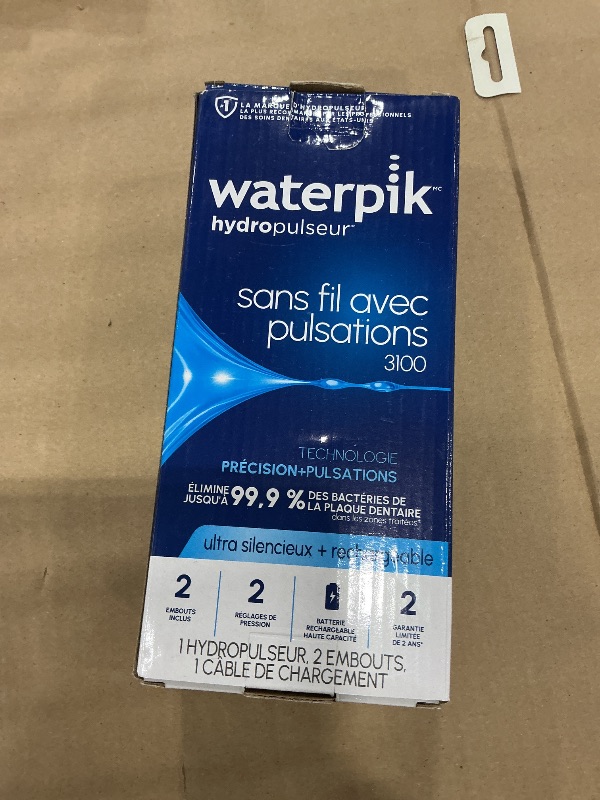 Photo 1 of Waterpik Cordless Pulse 3100 Portable Water Flosser, Rechargeable, White