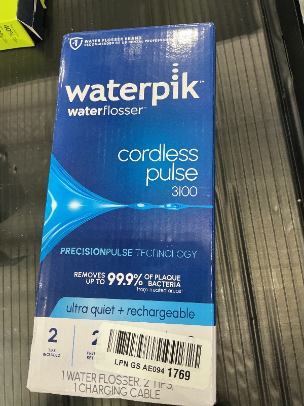 Photo 1 of Waterpik Cordless Pulse 3100 Portable Water Flosser, Rechargeable, White