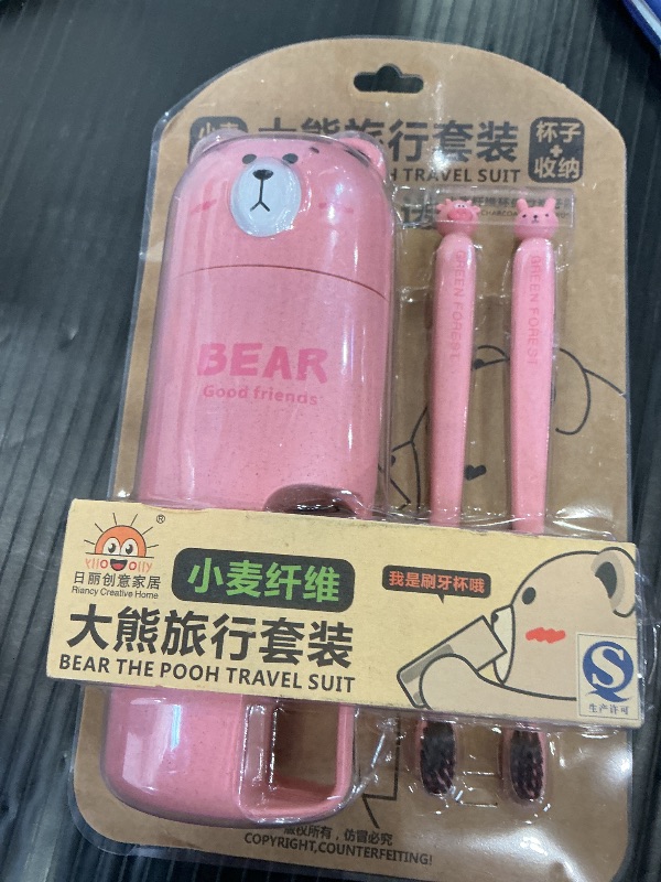 Photo 1 of whatRUeed Travel Toothbrush Holder & Toothbrush Set - Pink