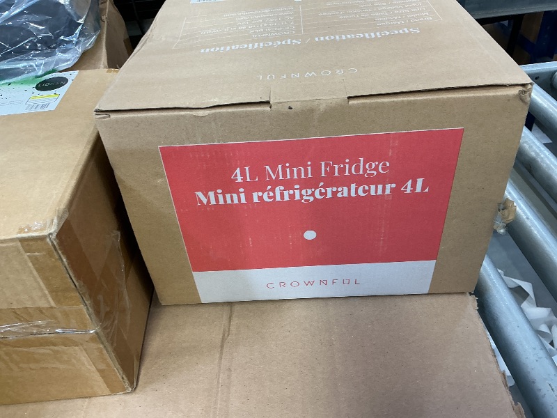 Photo 1 of CROWNFUL Mini Fridge, 4L Compact Cooler & Warmer