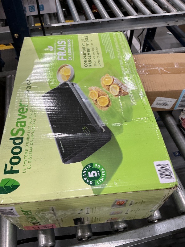 View 2 of FoodSaver FM2100 Vacuum Sealer Machine, One-Touch Sealing, Roll Storage & Cutter, Dry & Moist Food, For Sous Vide Cooking, Accessory Port & Hose, Starter Bags & Roll Included
