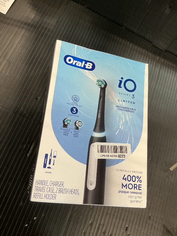 Photo 1 of Oral-B iO Series 3 Limited Deep Clean Rechargeable Electric Toothbrush for Adults, Black, 3 Modes, Smart Pressure Sensor, Plaque Removal and Gum Care, 2 Replacement Brush Heads, Travel Case