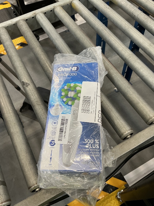 Photo 1 of Oral-B Pro 1000 Rechargeable Electric Toothbrush, White