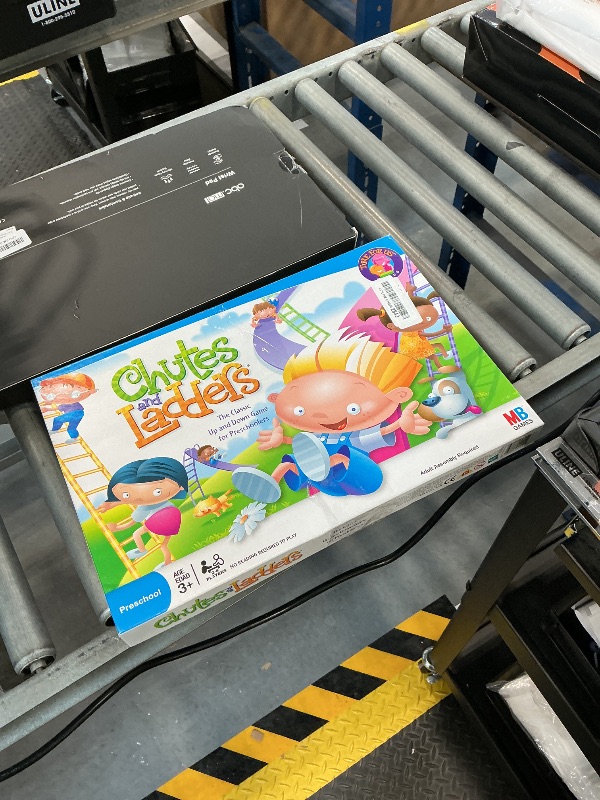 Photo 1 of Hasbro Gaming Chutes and Ladders Board Game