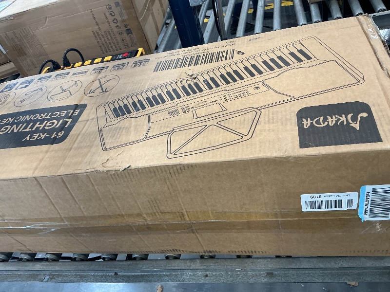 Photo 1 of JIKADA 61-Key Portable Electronic Keyboard Piano with Stand