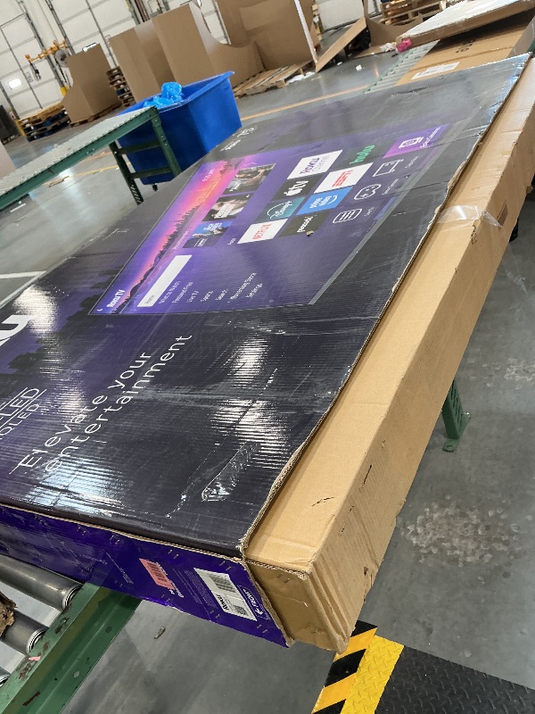 Photo 1 of FOR PARTS, DAMAGED SCREEN, NO CABLES **** Roku 75-Inch Pro Series Smart TV - 4K QLED Mini-LED TV - RokuTV