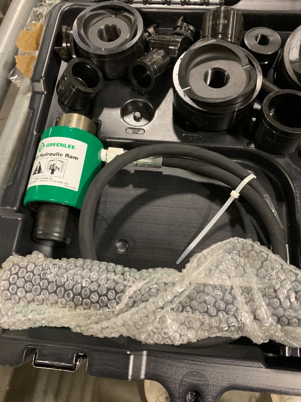 Photo 1 of ***SIMILAR ITEM*** Greenlee 7310SB 11-Ton Hydraulic Knockout Punch Kit with Hand Pump, Ram, 1/2" to 4" Slug-Buster Punches, Dies, and Hydraulic Draw Studs, Electrical Conduit Hole Cutter Kit