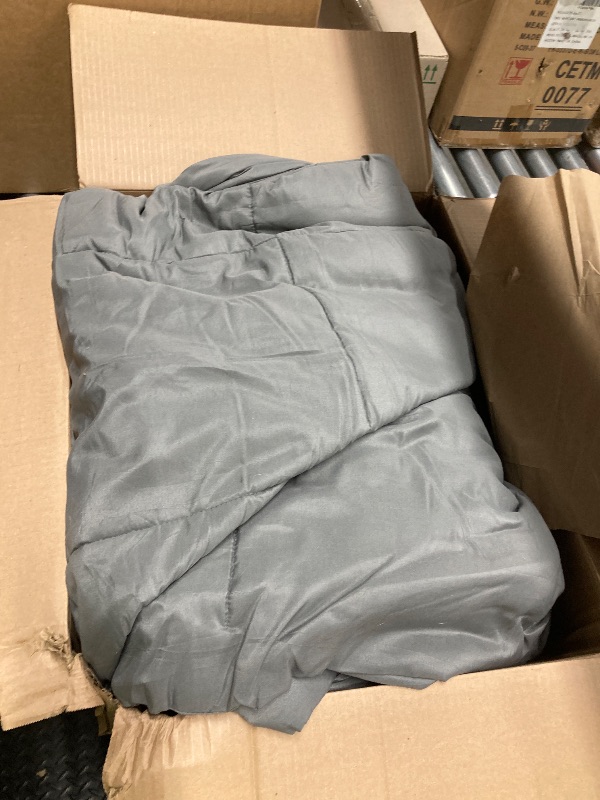 Photo 1 of grey comforter