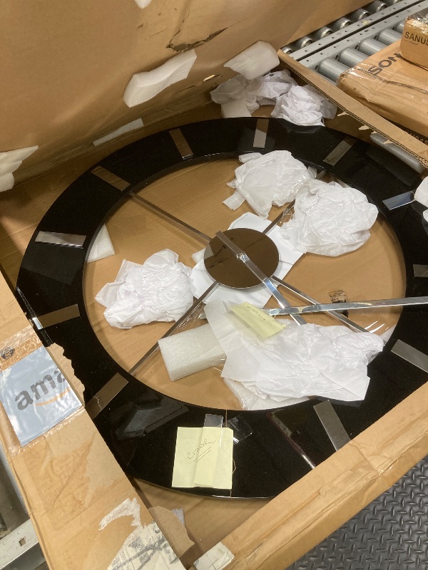 Photo 1 of **CHIPS AROUND RIM***Howard Miller Yates Wall Clock II 549-477 – High-Gloss Black Finish with Quartz Movement