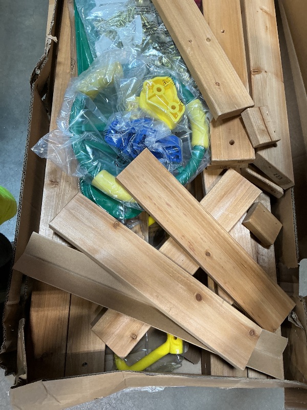 Photo 1 of ** two boxes. Minor dent damage** Backyard Discovery Mount Mckinley Cedar Wood Swing Set with Wave Slide, Play Deck, Double Rock Wall, Rope Ladder, Web Swing, Belt Swings, Toy Telescope, Steering Wheel, Sandbox Area, Outdoor Playset