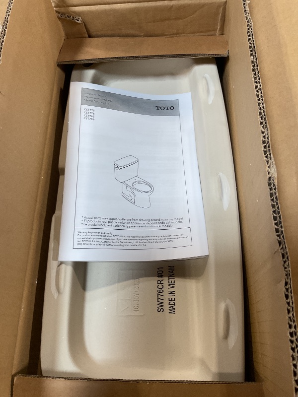 Photo 1 of ***TANK IS CRACKED*** TOTO Drake Two-Piece Elongated 1.6 GPF Universal Height TORNADO FLUSH Toilet with CEFIONTECT, Cotton White - CST776CSFG#01