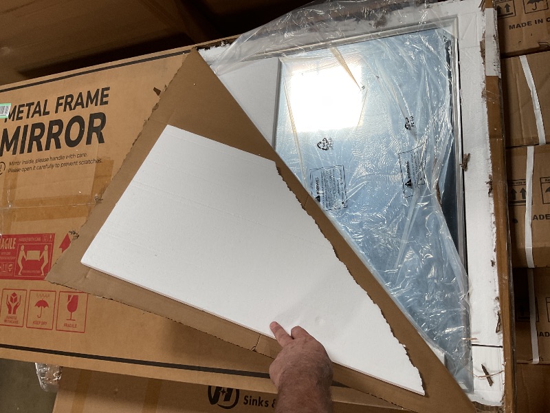 Photo 1 of **METAL FRAME MIRROR** approx 32”x64”
