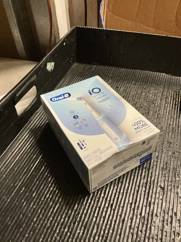 Photo 1 of Oral-B Rechargeable Electric Toothbrush, iO3 Limited Deep Clean, 3 Cleaning Modes, Visual Pressure Sensor to Protect Gums, 2 Brush Heads, Travel Case, ICY Blue
