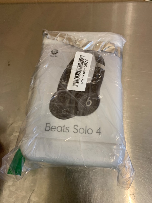 Photo 1 of Beats Solo 4 - Wireless On-Ear Bluetooth Headphones, Up to 50-Hour Battery Life, Ultra-Lightweight Comfort, Powerful and Balanced Sound, Apple & Android Compatible - Matte Black