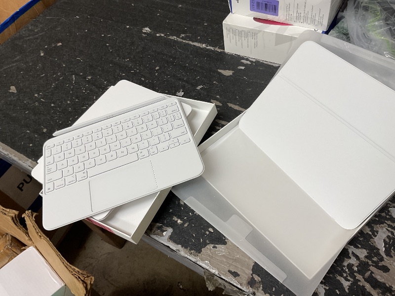 Photo 1 of Apple Magic Keyboard Folio: iPad Keyboard and case for iPad (A16 and 10th Generation), Detachable Two-Piece Design that attaches magnetically, Built-in trackpad, US English – White