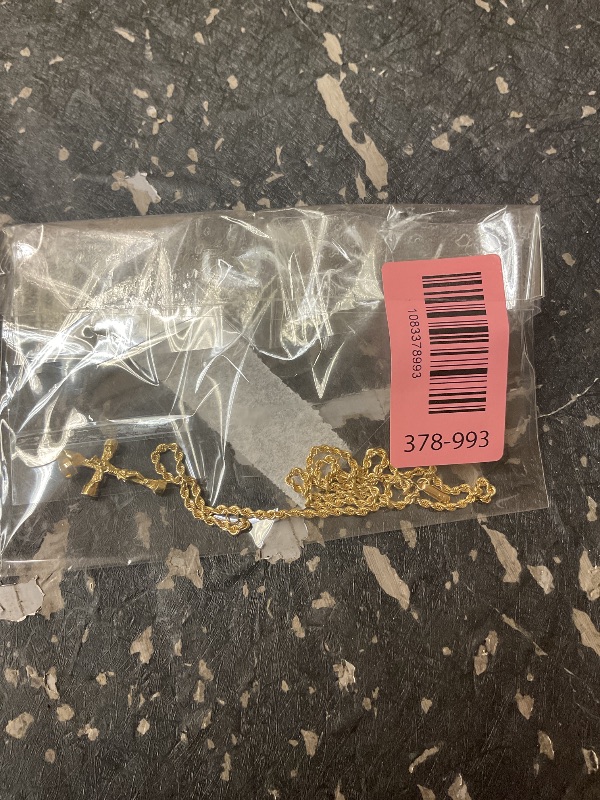 Photo 1 of WOMEN’S10K GOLD STAMPED CHAIN WITH CRUCIFIX PENDANT STAMPED 10K, 1 1/2 INCHES DROP JEWELRY