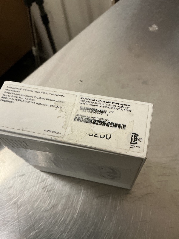 Photo 1 of Apple AirPods Wireless Earbuds with Lightning Charging Case