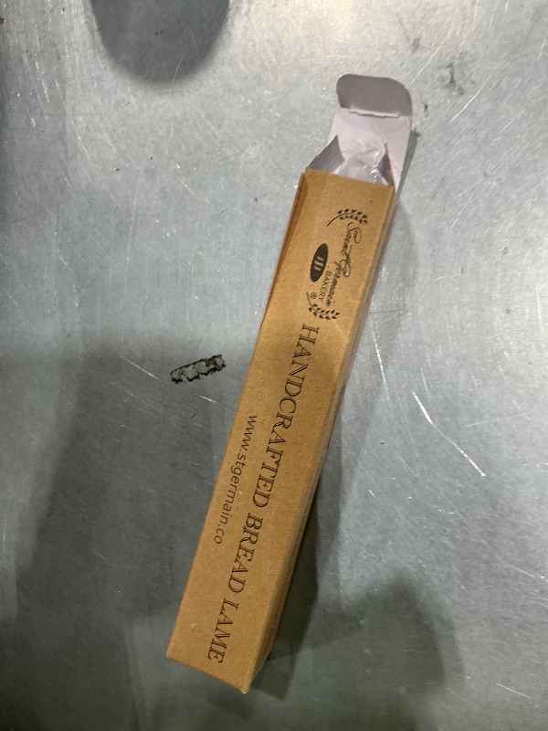 Photo 1 of "SAINT GERMAIN Premium Hand Crafted Bread Lame for Dough Scoring Knife, Lame Bread Tool for Sourdough Bread Slashing with 10 Blades Included with Replacement with Authentic Leather Protector Cover"