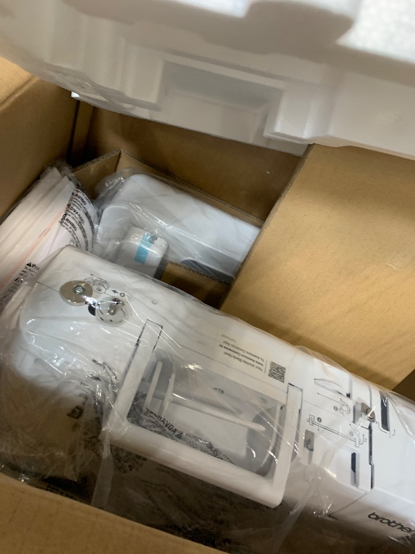 Photo 1 of ***UPDATED 8/15*** Brother SE700 Sewing and Embroidery Machine, Wireless LAN Connected, 135 Built-in Designs, 103 Built-in Stitches, Computerized, 4" x 4" Hoop Area, 3.7" Touchscreen Display, 8 Included Feet, White