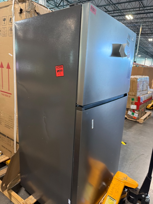 Photo 1 of ** DAMAGE MINOR** BLACK+DECKER 24 Cu. Ft. Top Mount Refrigerator