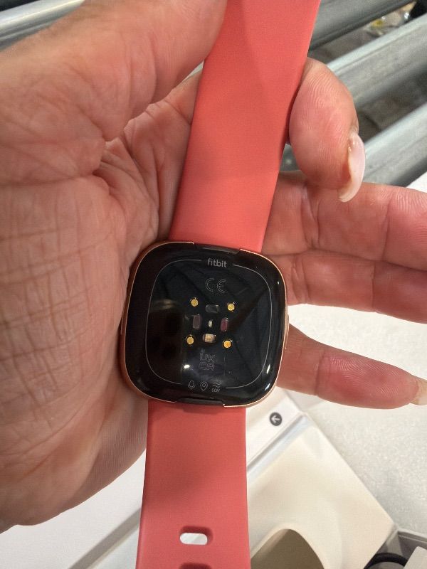 Photo 1 of Fitbit Versa 4 Fitness Smartwatch with Daily Readiness - 3-Month Google Health Premium Membership Included - GPS, 24/7 Heart Rate, 40+ Exercise Modes, Sleep Tracking - Pink Sand/Copper Rose