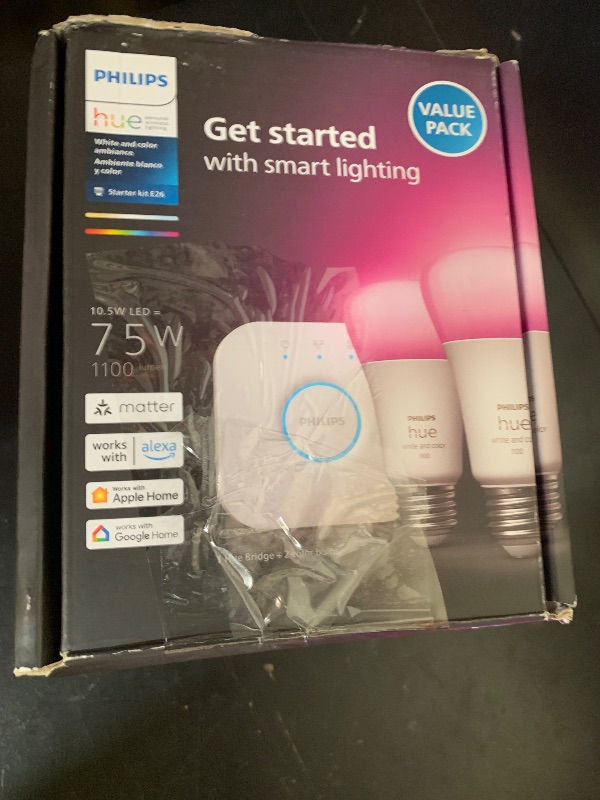 Photo 1 of Philips Hue Smart Light Bulbs Starter Kit, Includes (1) Bridge, (2) 75W A19 Bulbs, White and Color Ambiance LED Color Changing Lights, 1100LM, E26, Control with App or Voice Assistant