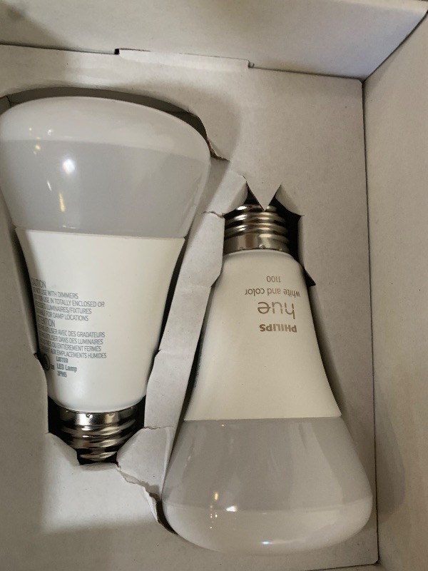 Photo 1 of Philips Hue Smart Light Bulbs Starter Kit, Includes (1) Bridge, (2) 75W A19 Bulbs, White and Color Ambiance LED Color Changing Lights, 1100LM, E26, Control with App or Voice Assistant