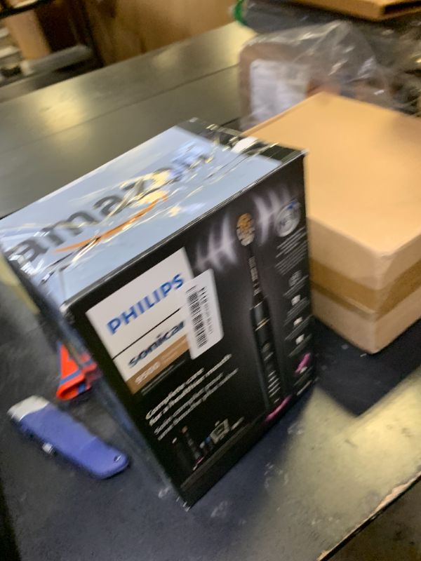 Photo 1 of Philips Sonicare DiamondClean Smart 9500 Electric Toothbrush - Sonic Toothbrush with App, Pressure Sensor, 15 Brushing Settings, Replacement Reminder, USB Charging Travel Case, Black, Model HX9923/11