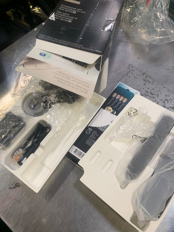 Photo 1 of Philips Sonicare DiamondClean 9900 Prestige Electric Toothbrush - with SenseIQ Technology and Advanced AI App, 5 Brushing Modes, 3 Intensity Levels, Charging Travel Case, Quartz Black, Model BD7001AZ