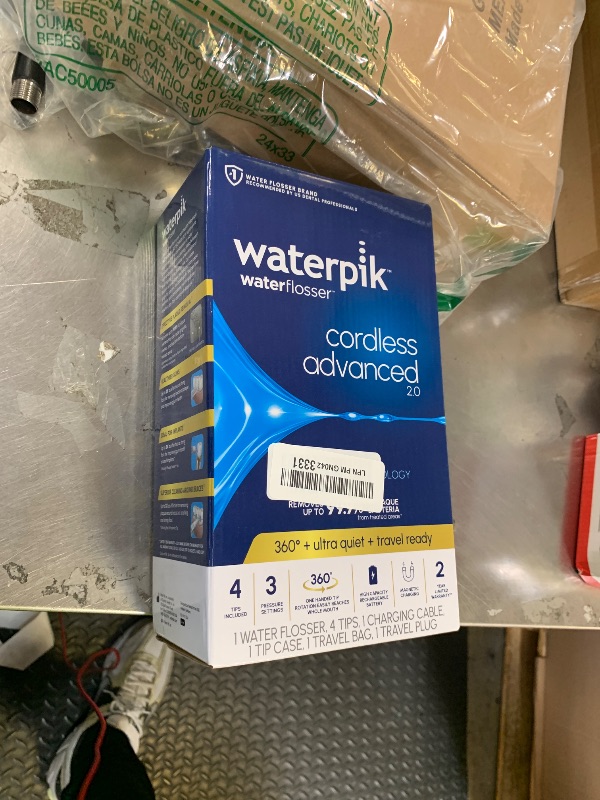 Photo 1 of Waterpik Cordless Advanced 2.0 Water Flosser For Teeth, Gums, Braces, Dental Care With Travel Bag and 4 Tips, ADA Accepted, Rechargeable, Portable, and Waterproof, Gray WP-587, Packaging May Vary