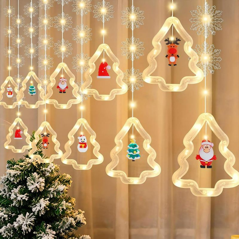 Photo 1 of 9.8 Ft Christmas Window Lights Christmas Tree Shape Curtain Lights with 120 LED, 8 Modes,Snowflake, Figurines Ornaments,Curtain Hanging Fairy String Lights for Bedroom Wall Window Indoor Decor