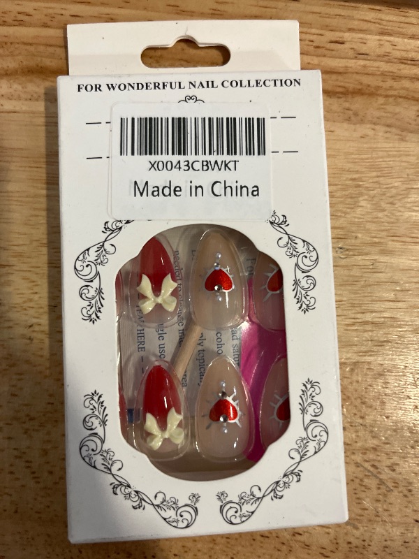Photo 1 of Press on Nails Medium Almond Fake Nails Red Gradient Full Cover Bow Charm False Nails with Sliver Heart Designs Glossy Glue on Nails Cute Acrylic Artificial Nails for Women Girls 24Pcs