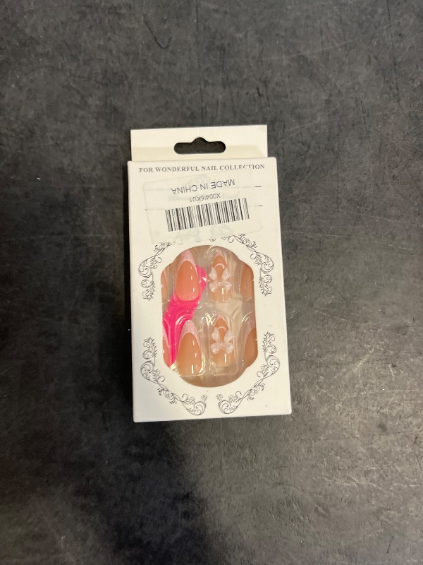 Photo 1 of 24Pcs French Tip Press on Nails Medium Almond Fake Nails with Pink Charms Bow Designs Nude Glossy Full Cover Artificial Glue on Nails Cute False Nails Stick on Nails for Women Girls DIY Manicure Kit