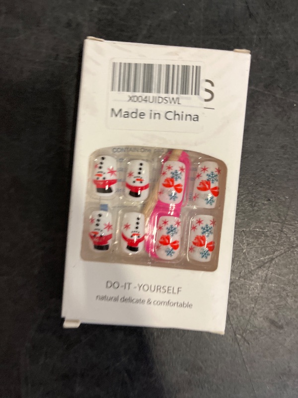 Photo 1 of Christmas Press on Nails Medium Square Fake Nails with Snowflake Designs Full Cover Winter Xmas Cute Snowman Acrylic Stick on Nail White False Nails for Women Holidy Manicure Art 24 PCS