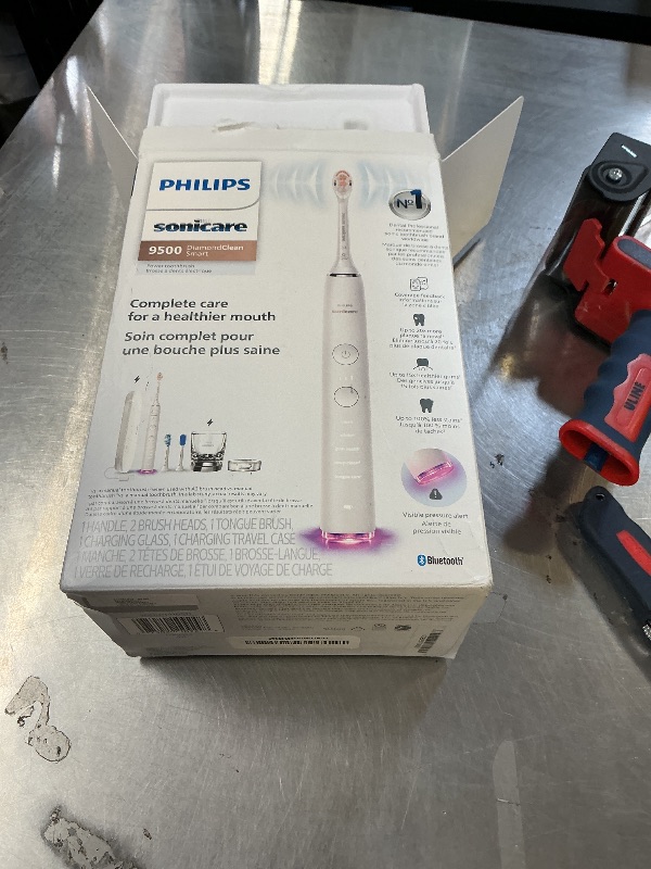 Photo 1 of Philips Sonicare DiamondClean Smart 9500 Electric Toothbrush - Sonic Toothbrush with App, Pressure Sensor, 15 Brushing Settings, Replacement Reminder, USB Charging Travel Case, White, Model HX9923/01