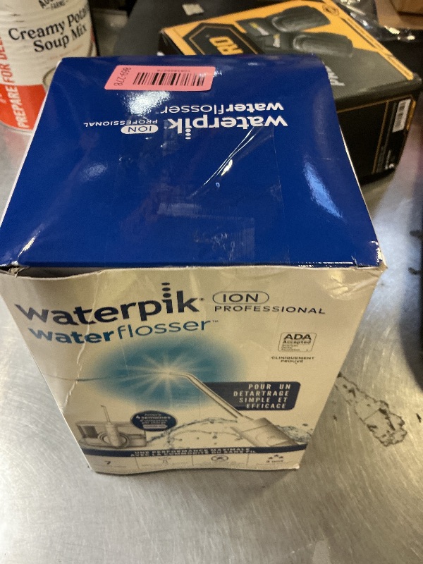 Photo 1 of Waterpik ION Professional Water Flosser, Rechargeable and Portable for Teeth, Gums, Braces, 10 Settings, 7 Flossing Tips For Multiple Users And Needs, ADA Accepted, WF-12 White, Packaging May Vary