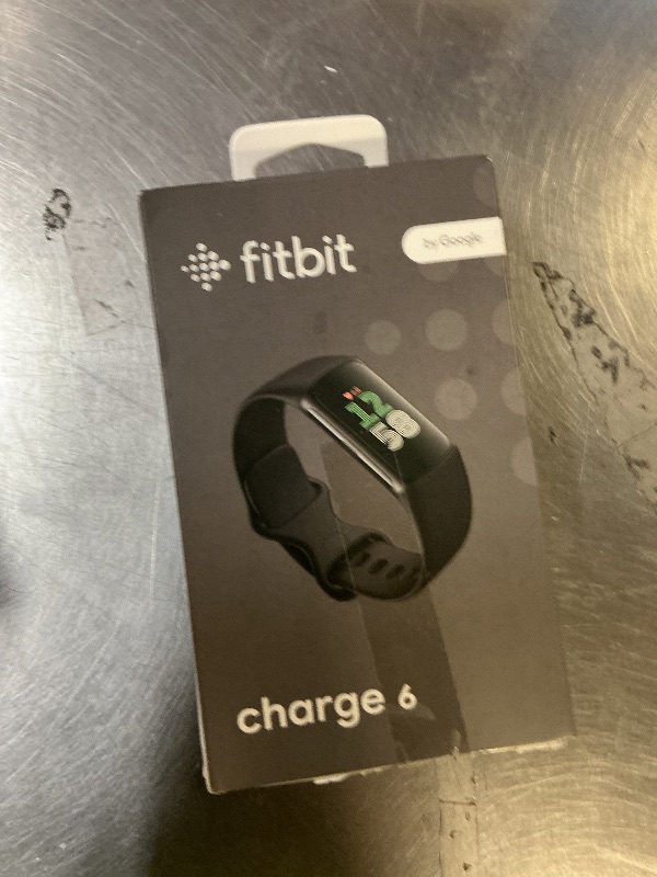 Photo 1 of Fitbit Charge 6 Fitness Tracker with Google Apps - Heart Rate on Exercise Equipment - 3-Month Google Health Premium Membership Included - Health Tools - Obsidian/Black - Small&Large Bands Included