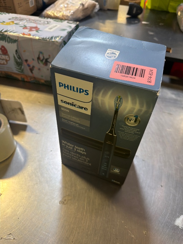 Photo 1 of Philips Sonicare DiamondClean 9000 Electric Toothbrush - Sonic Toothbrush with App, Pressure Sensor, 12 Brushing Settings, Replacement Reminder, Charging Stand, Travel Case, Aquamarine, HX9911/92