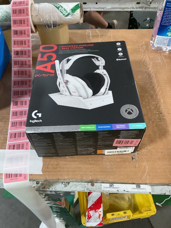 Photo 1 of **FOR PARTS, MIC DOES NOT WORK, ISSUES WITH SOUND**Logitech G Astro A50 Multi-Platform Wireless Gaming Headset + Base Station for PS5/Xbox/PC: PLAYSYNC Audio Switcher, <16bit/48kHz (Console), <24bit/48kHz (PC), 24hr Battery, 2.4GHz & BT - White