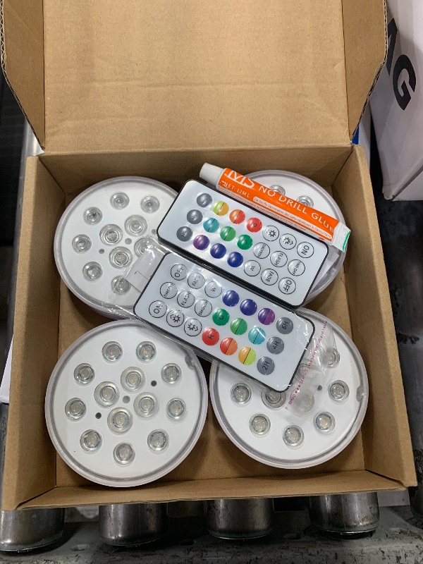 Photo 1 of **MISSING CHARGER** U UZOPI Pool Lights, Upgraded Rechargeable Submersible LED Lights with Remote IP68 Waterproof 16 Colors Hot Tub Underwater Pool Lights for Above Ground Pool, Bath, Party, Vase 4 Pack